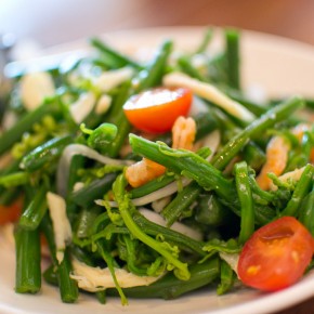 Salmon strips on a bed of seaweed stems